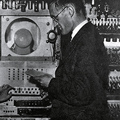 Freddie Williams and Tom Kilburn, the inventors of the Baby, shown programming the Manchester Mk 1 computer