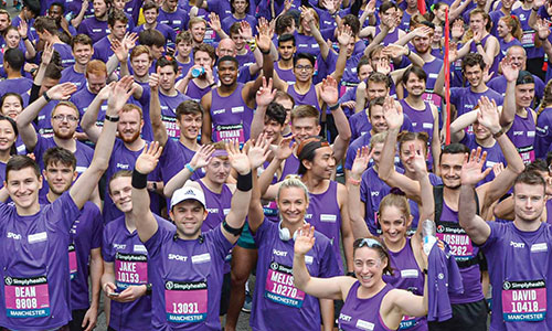 Thousands of staff, students and alumni together in a ‘Purple
Wave’ for the Simplyhealth Great Manchester Run, raising money for good causes.